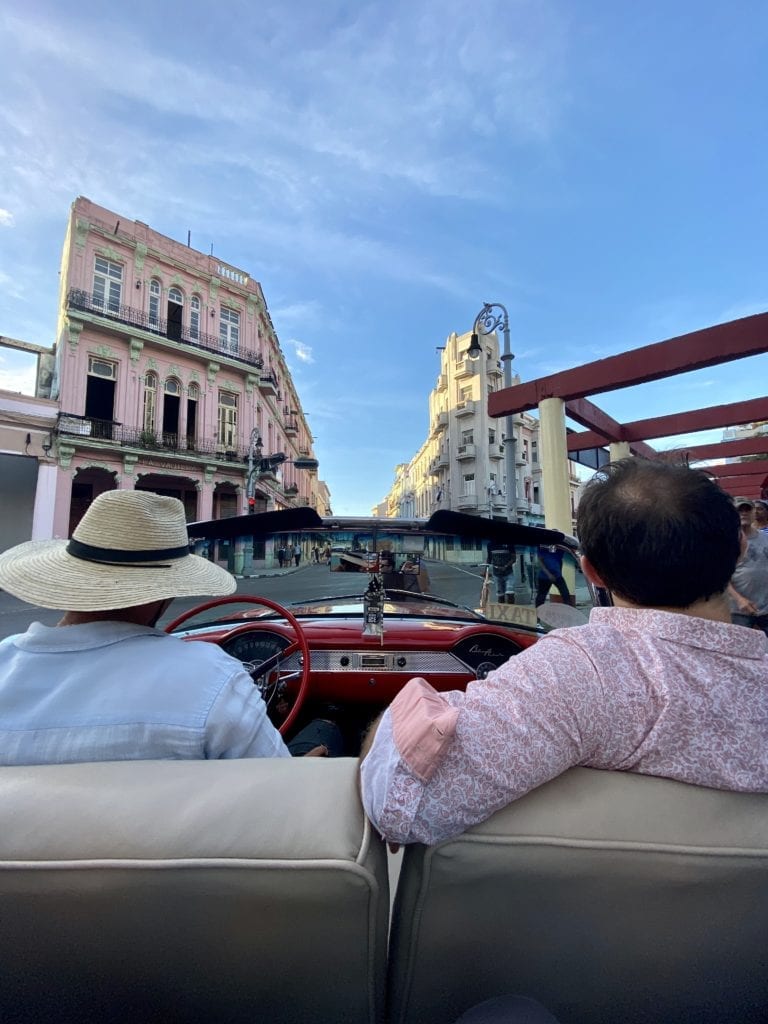 riding in a car in Cuba