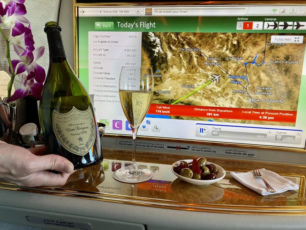business Class vs First Class champagne